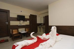 Letto o letti in una camera di The Nest with open rooftop cafe Mecleodganj