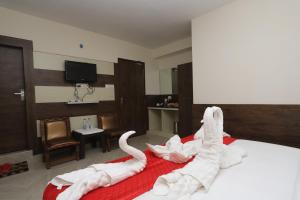 Letto o letti in una camera di The Nest with open rooftop cafe Mecleodganj