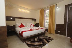 Letto o letti in una camera di The Nest with open rooftop cafe Mecleodganj