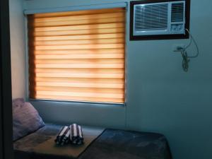 Televisyen dan/atau pusat hiburan di Trees Residences Staycation