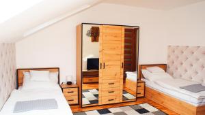 Katil atau katil-katil dalam bilik di Liget Apartman