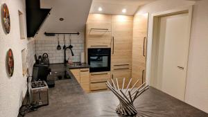 Kuchyň nebo kuchyňský kout v ubytování Ferienwohnung Albbruck/Albert