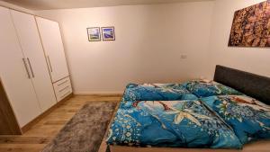 Postel nebo postele na pokoji v ubytování Ferienwohnung Albbruck/Albert