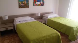Posteľ alebo postele v izbe v ubytovaní B&B Fontanelle