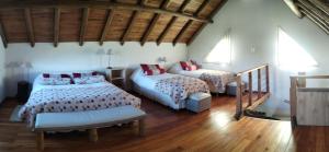 Postel nebo postele na pokoji v ubytování Cabañas Mapu Suyai