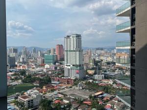 a view of a city from a building at Summer suites klcc by Peaceful Nest in Kuala Lumpur