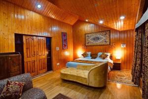 Llit o llits en una habitació de Sojourn Cottages Pahalgam