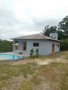 Swimmingpoolen hos eller tæt på aluga-se casa Itapeva torres