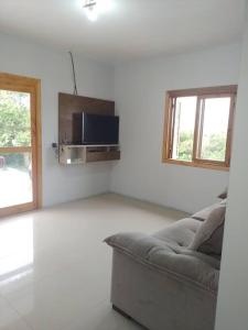 Et tv og/eller underholdning på aluga-se casa Itapeva torres