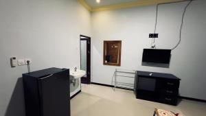Televisi dan/atau pusat hiburan di Setiya Homestay