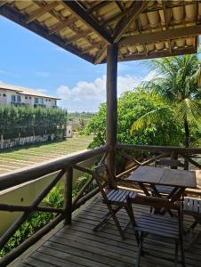 En balkon eller terrasse på Refúgio Amarelo na Praia da Espera