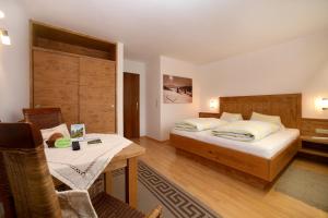 Posteľ alebo postele v izbe v ubytovaní Appartement Lackner