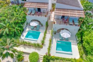 Bazén v ubytování Alma Boutique Hotel nebo v jeho okolí