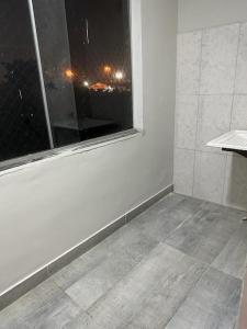 Ein Badezimmer in der Unterkunft Apartamento com vista para palco festival