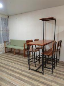 Posezení v ubytování Papaturro House + 7 fotografií