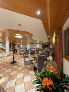 Restoran või mõni muu söögikoht majutusasutuses Hotel Larch