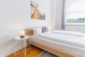 Postel nebo postele na pokoji v ubytování Strandkoje