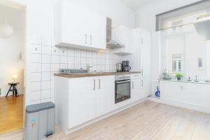 Kuchyň nebo kuchyňský kout v ubytování Strandkoje + 22 fotografií