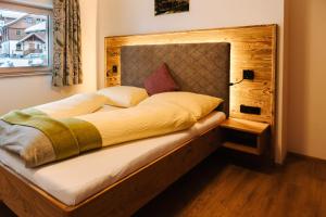 Posteľ alebo postele v izbe v ubytovaní Apartments Haufhof , Haus im Ennstal bei Schladming