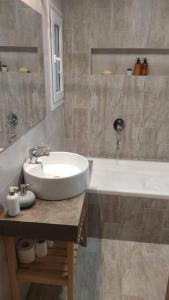 Ένα μπάνιο στο Casa Nature View Golf Sierra de los Padres Mar del Plata