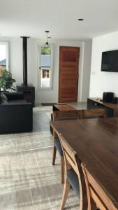 Χώρος καθιστικού στο Casa Nature View Golf Sierra de los Padres Mar del Plata +1 φωτογραφίες