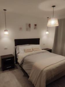 Ένα ή περισσότερα κρεβάτια σε δωμάτιο στο Casa Nature View Golf Sierra de los Padres Mar del Plata