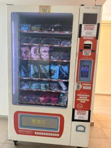 a vending machine filled with lots of bags at The Ambiance, Melaka in Malacca