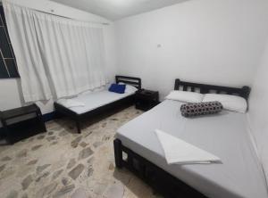Katil atau katil-katil dalam bilik di Hotel Marqués de San Luis