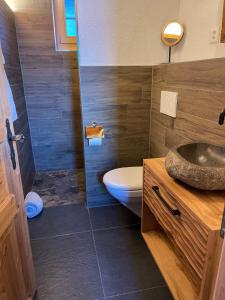 Baðherbergi á Hotel Jägerstübli Grindelwald