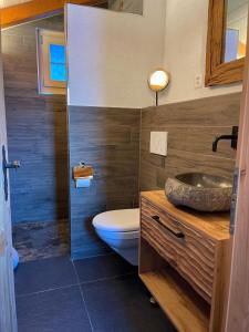 Baðherbergi á Hotel Jägerstübli Grindelwald