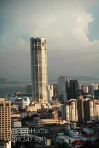 a view of a city with a tall building at Seaview Mansion One Georgetown in George Town