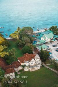 an aerial view of a house on a island in the water at Seaview Mansion One Georgetown in George Town