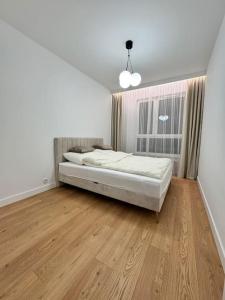 Postel nebo postele na pokoji v ubytování Forest Apart IV