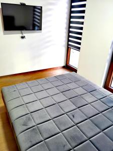 Letto o letti in una camera di Borovi 3, apartman 4