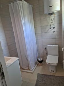 Een badkamer bij HM Apartmani