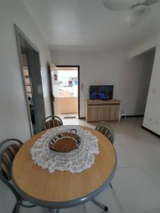 Et tv og/eller underholdning på Apartamento ótima localização