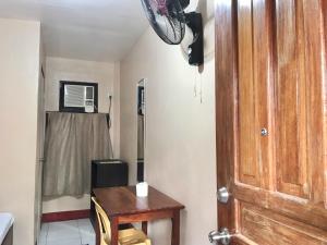 TV a/nebo společenská místnost v ubytování JBR Tourist Inn - Port Barton