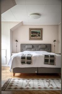 Cama o camas de una habitación en Vita Huset på Österlen