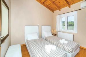 Postel nebo postele na pokoji v ubytování Villa Rea + 30 fotografií