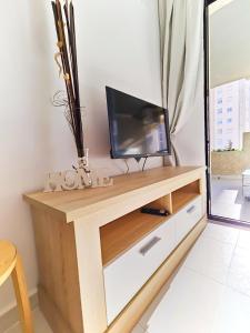 Telewizja i/lub zestaw kina domowego w obiekcie Playa Levante Lux Mar