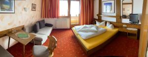 Posteľ alebo postele v izbe v ubytovaní Landhaus Engadin