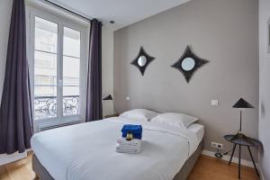 Ένα ή περισσότερα κρεβάτια σε δωμάτιο στο Rent a Room apartments - Alma