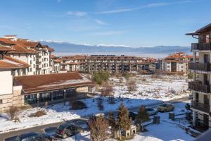 an aerial view of a city in the snow at Light One Bed Flat next to the Ski Lift in Bansko