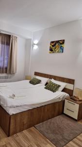 Postel nebo postele na pokoji v ubytování Mavrovo Forest Apartments