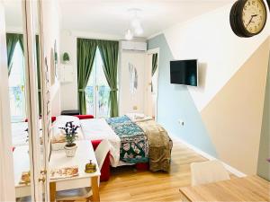 TV a/nebo společenská místnost v ubytování SuiteCorso