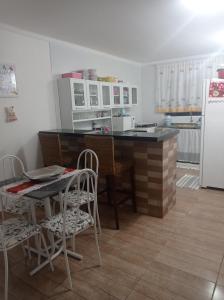 Kjøkken eller kjøkkenkrok på Casa aconchegante - Localizada à 300 metros do Forrogaço
