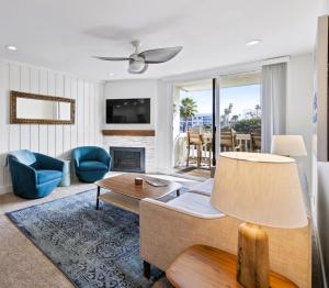 a living room with a couch and a table at Brooks Beach Vacations House B222 Oceanside in Oceanside