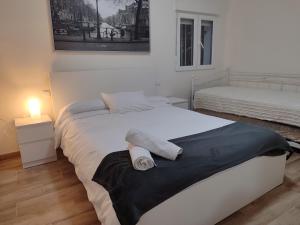 Katil atau katil-katil dalam bilik di Angy Home Chueca Gran Via