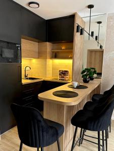 Kuchyň nebo kuchyňský kout v ubytování Gold Lux Home
