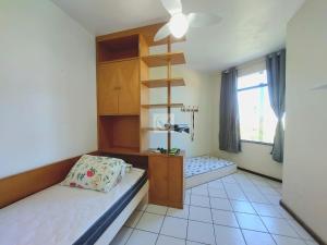 Ένα ή περισσότερα κρεβάτια σε δωμάτιο στο Casa vista mar +16 φωτογραφίες